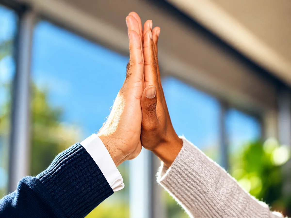 High-five business relationship. Editorial illustration of partnership / collaboration / sales.