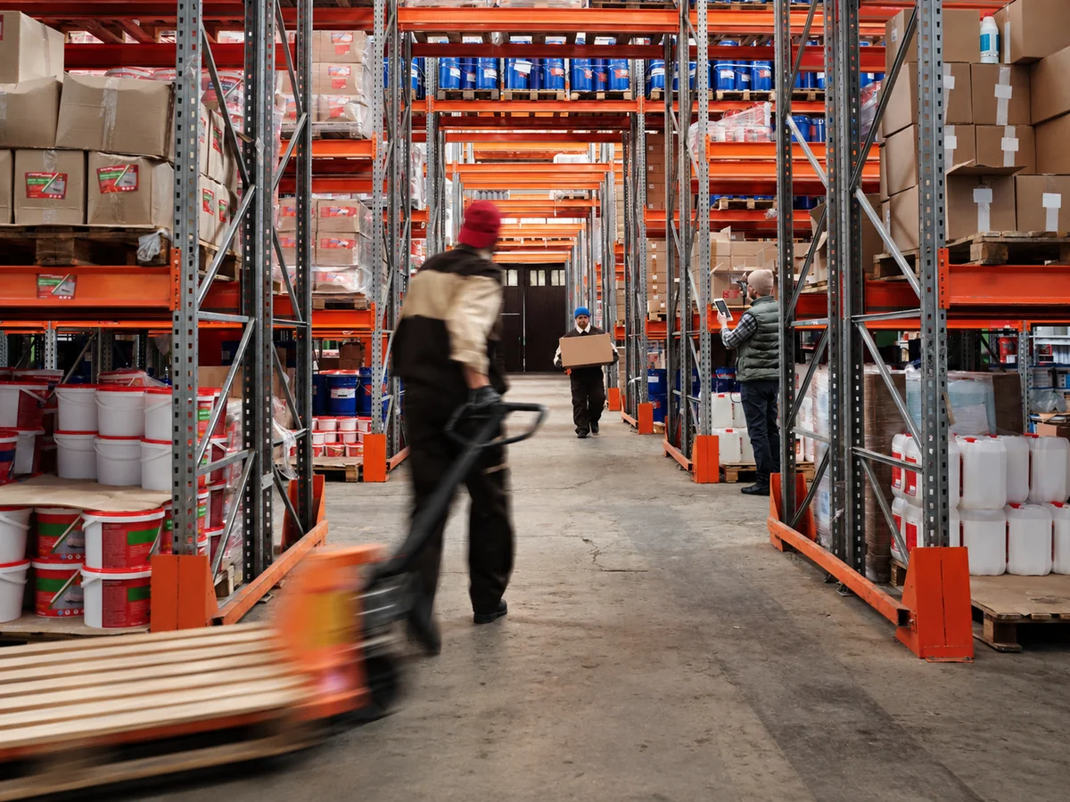 distribution_LEFT_PALLET_JACK_APPROVED_EDITED.png. Editorial illustration of handling / pallets / warehousing.